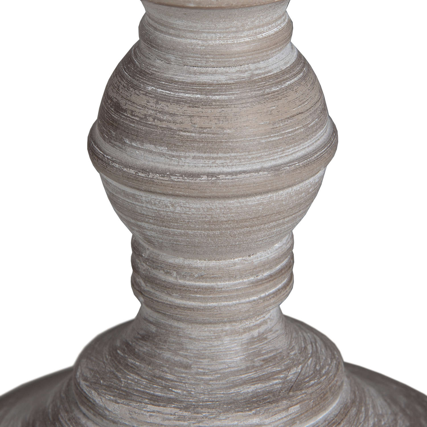 Close-up of a textured vase on a white background