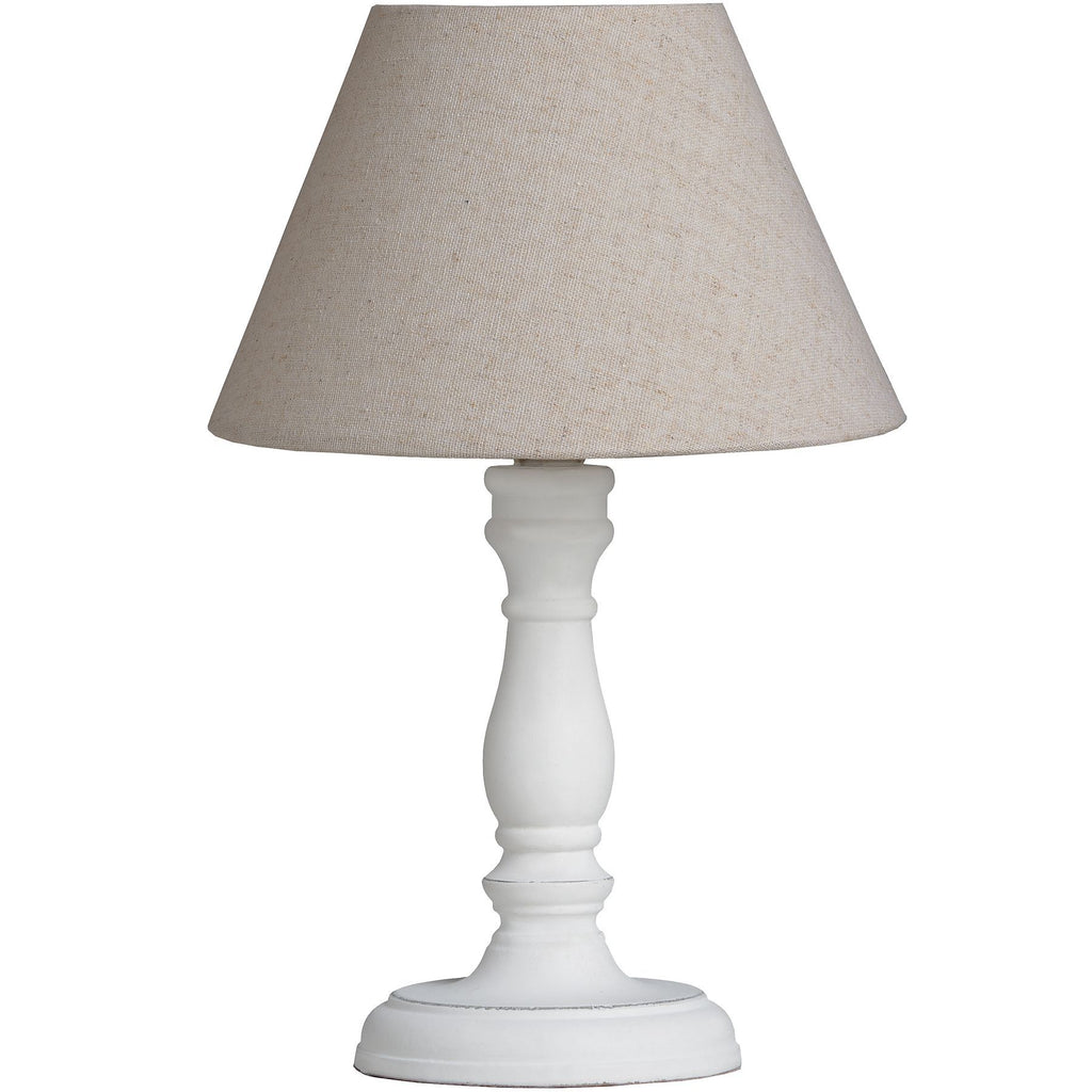 White table lamp with a beige lampshade on a white background