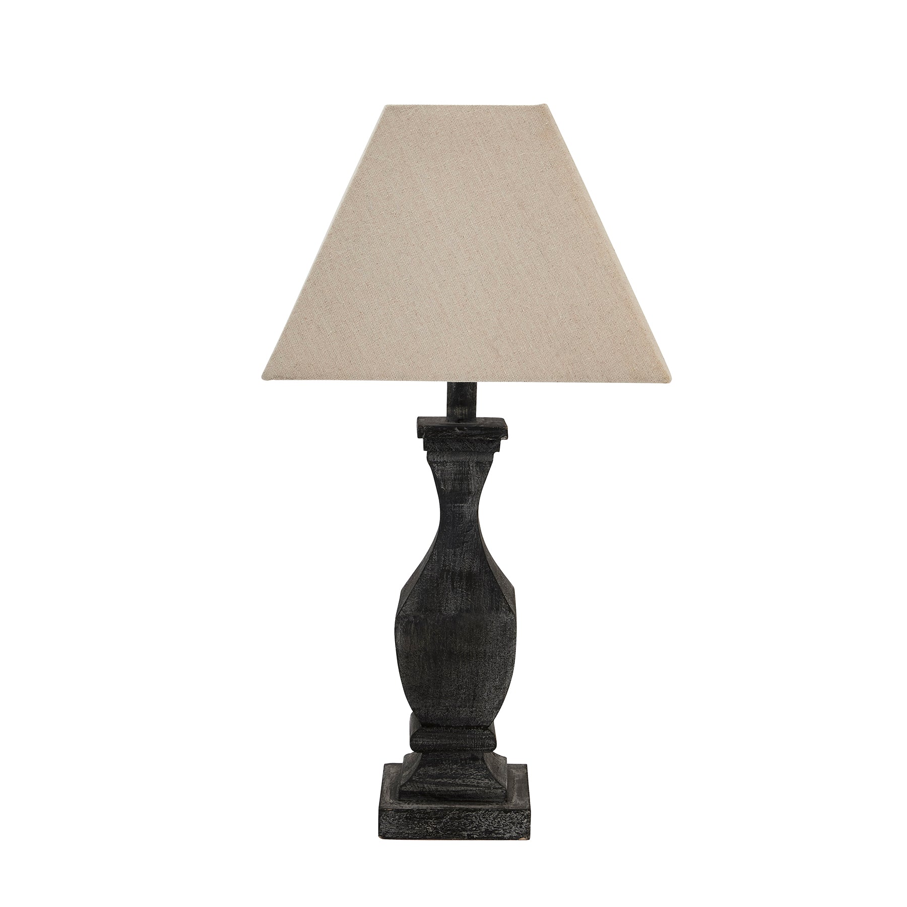 Table lamp with a beige shade on a white background
