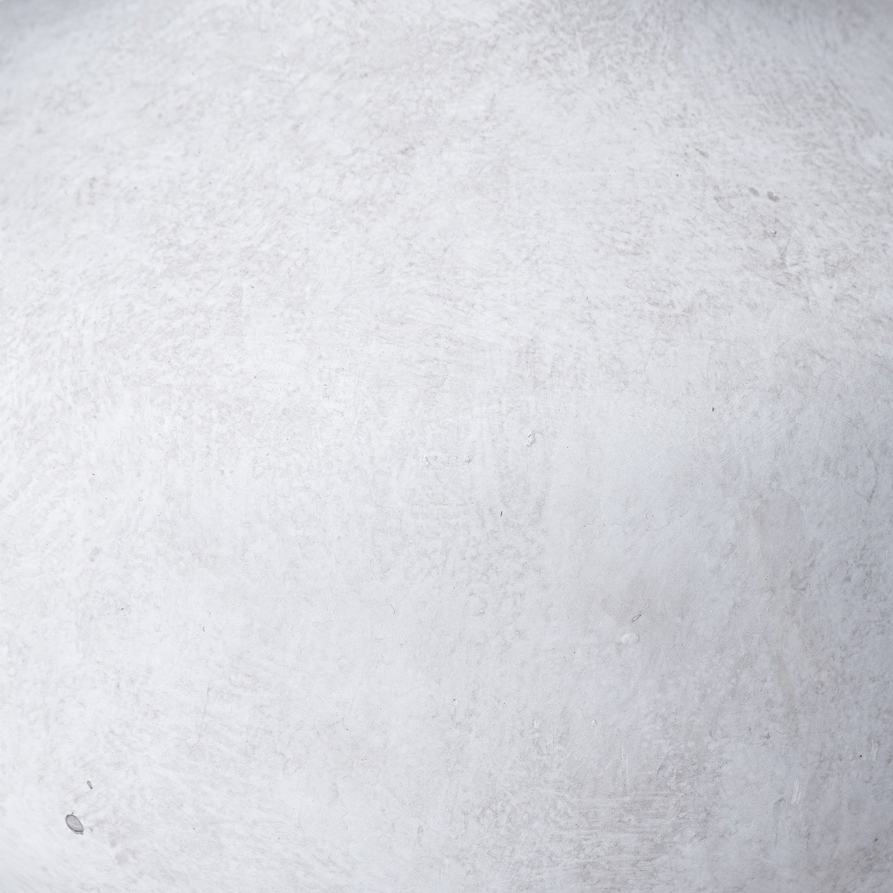 Close-up of a textured white surface