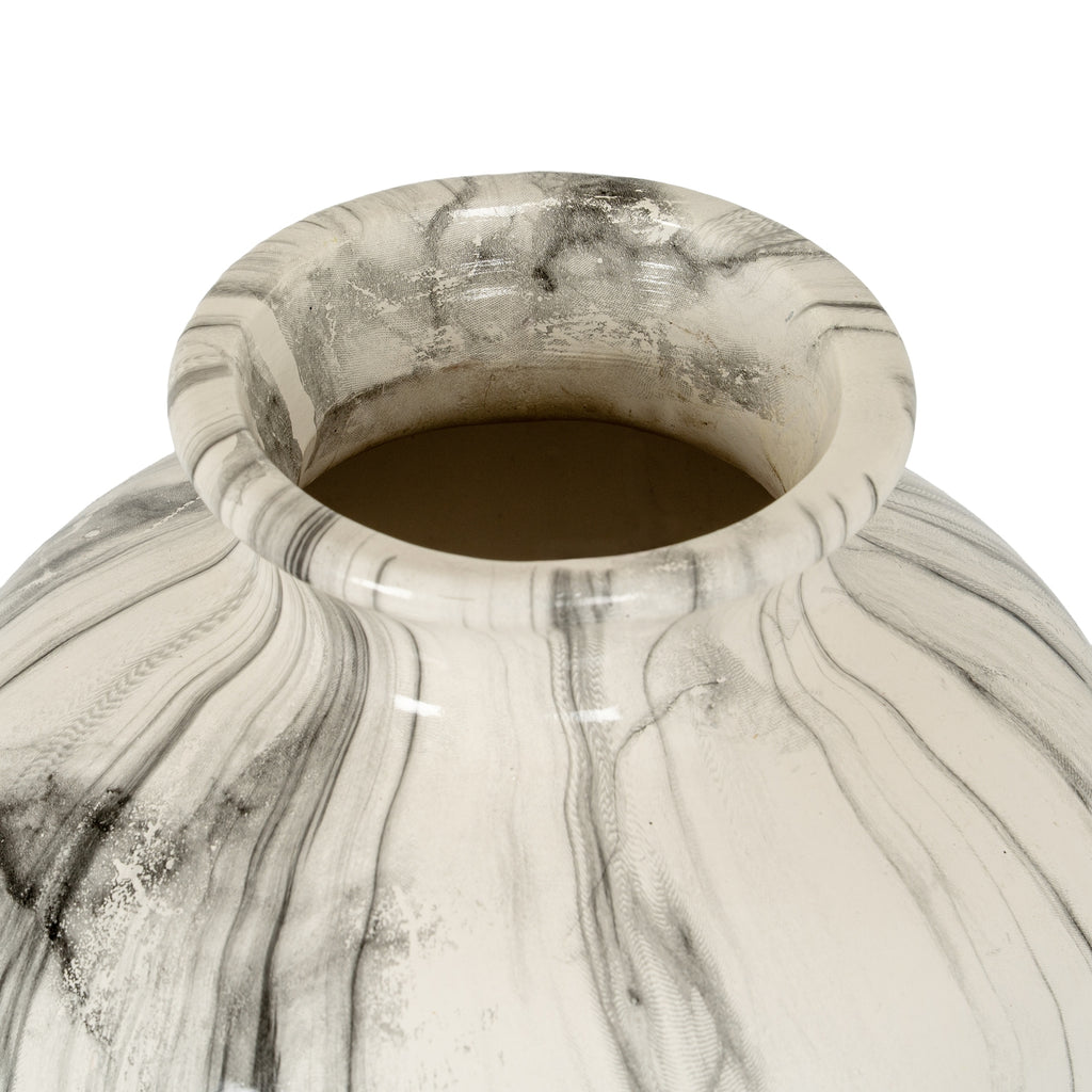 Marble-patterned vase on a white background