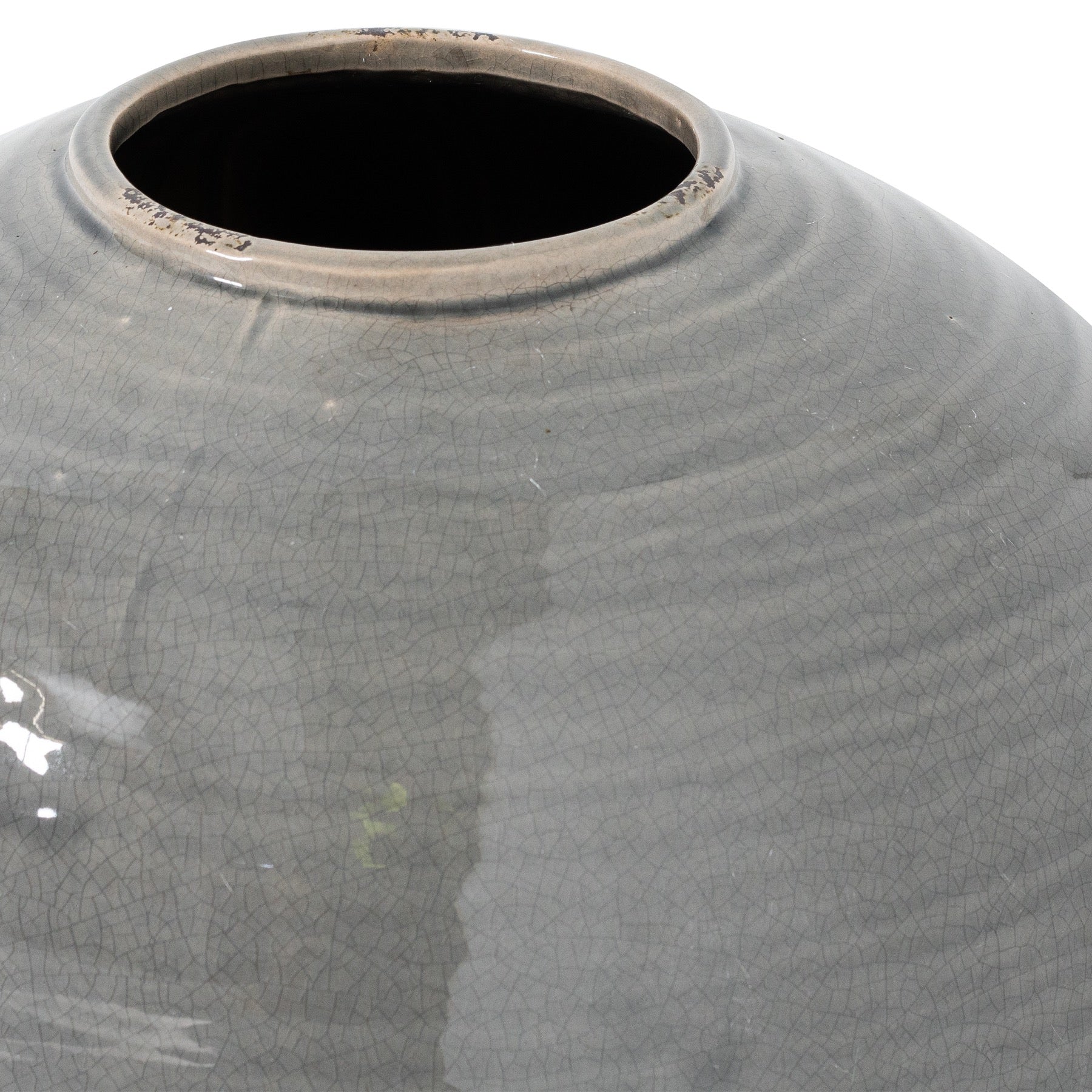 Close-up of a textured gray ceramic vase