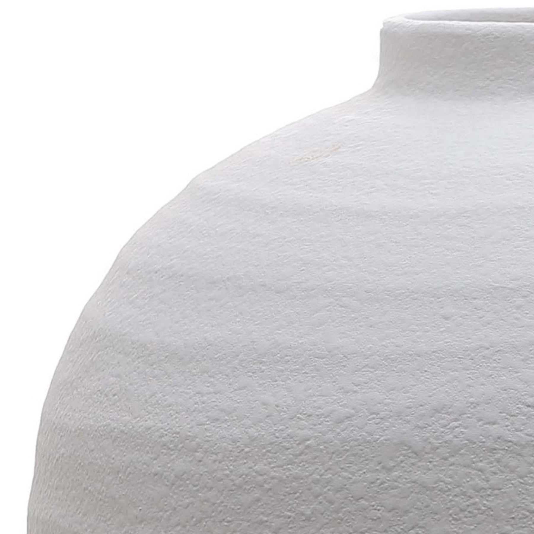 Close-up of a textured white ceramic vase on a white background