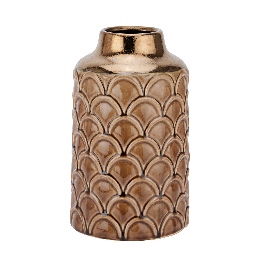 Decorative vase with a scalloped pattern on a white background