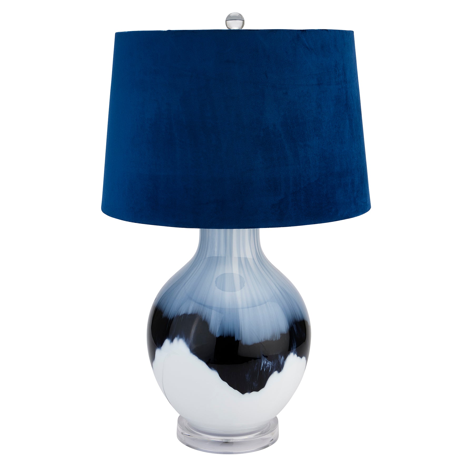 Table lamp with a blue shade and white and black base on a white background