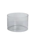 Clear glass cake stand on a white background