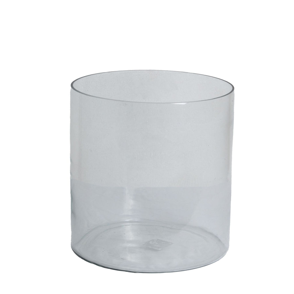 Clear cylindrical glass vase on a white background