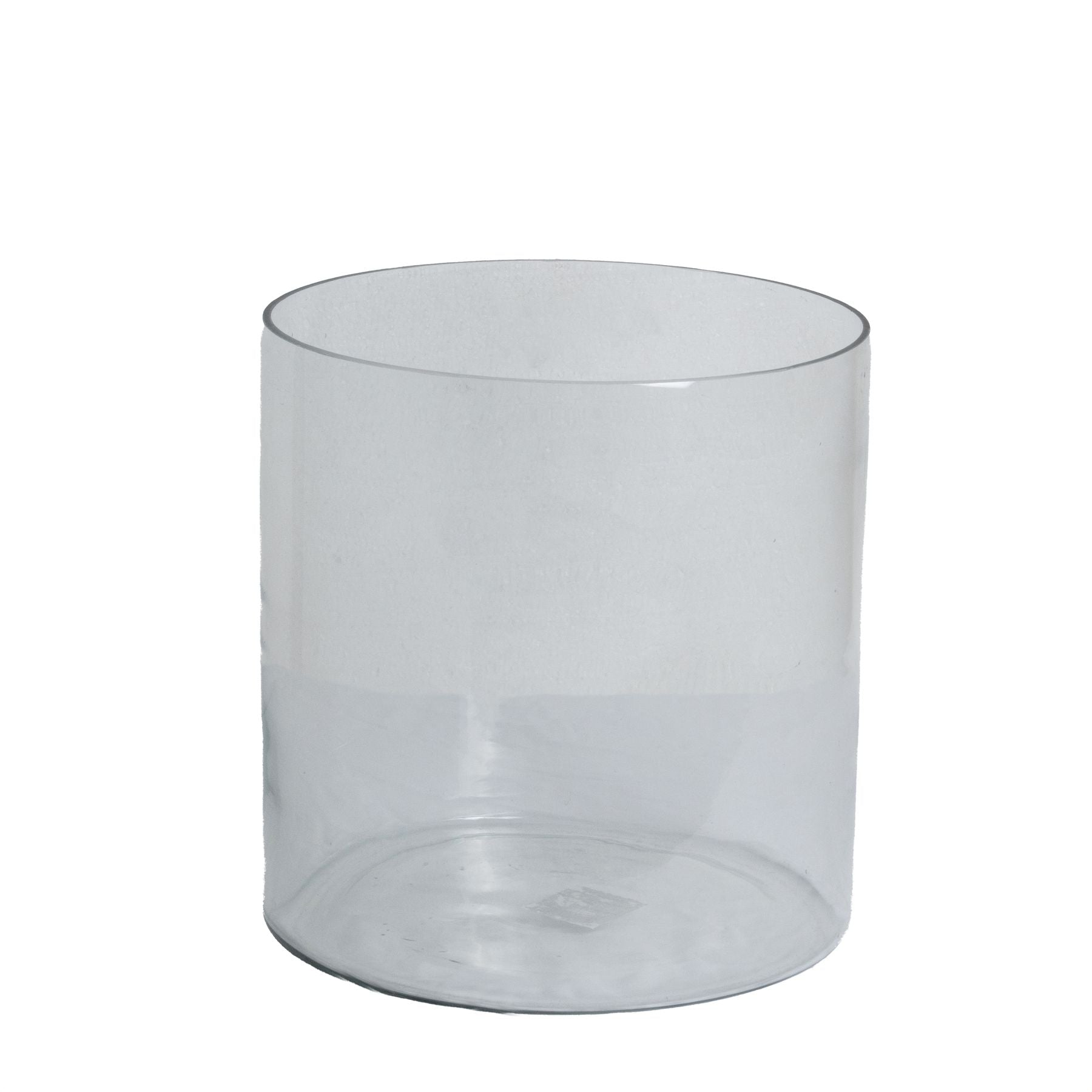 Clear cylindrical glass vase on a white background