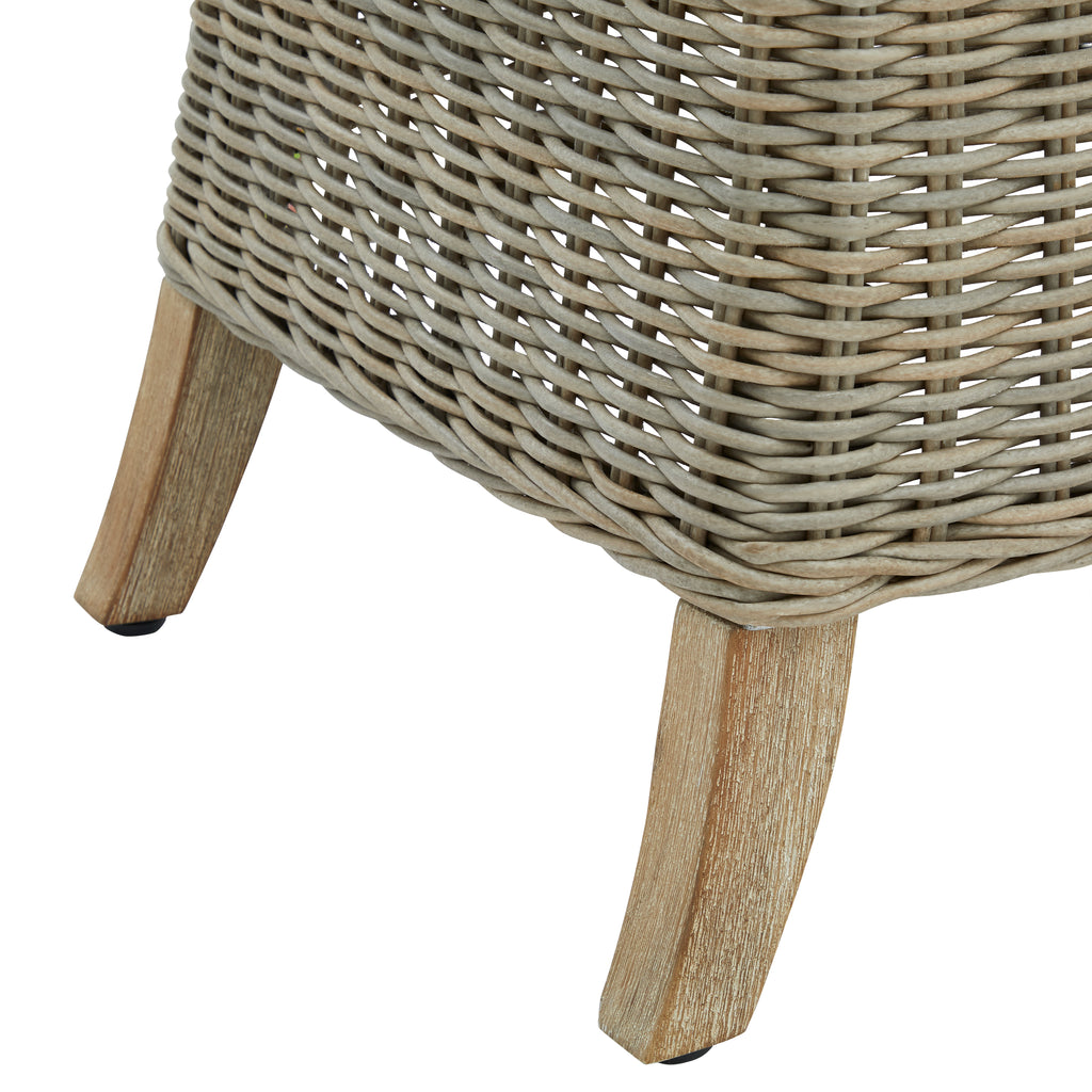 Wicker side table with wooden legs on a white background