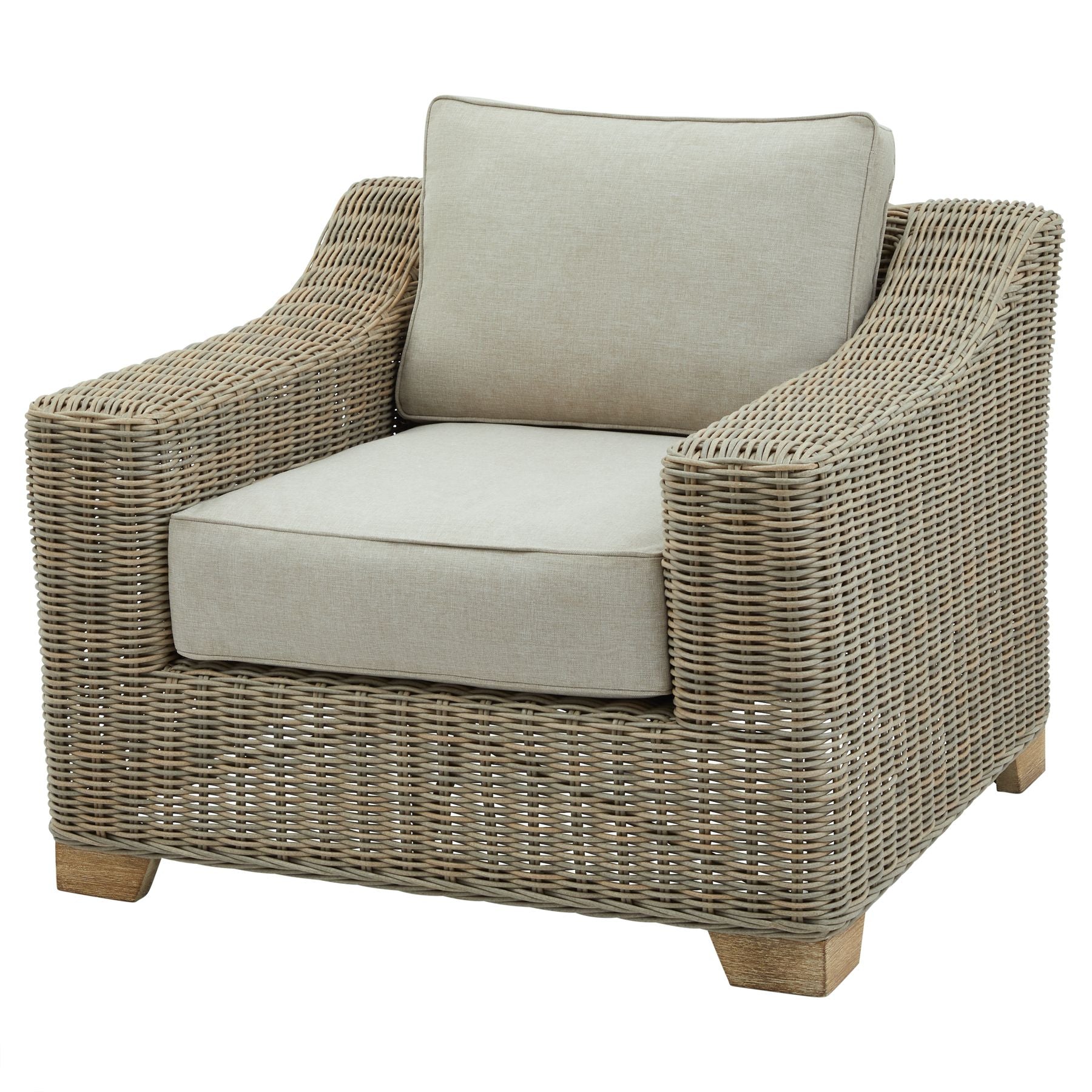Wicker armchair with beige cushions on a white background