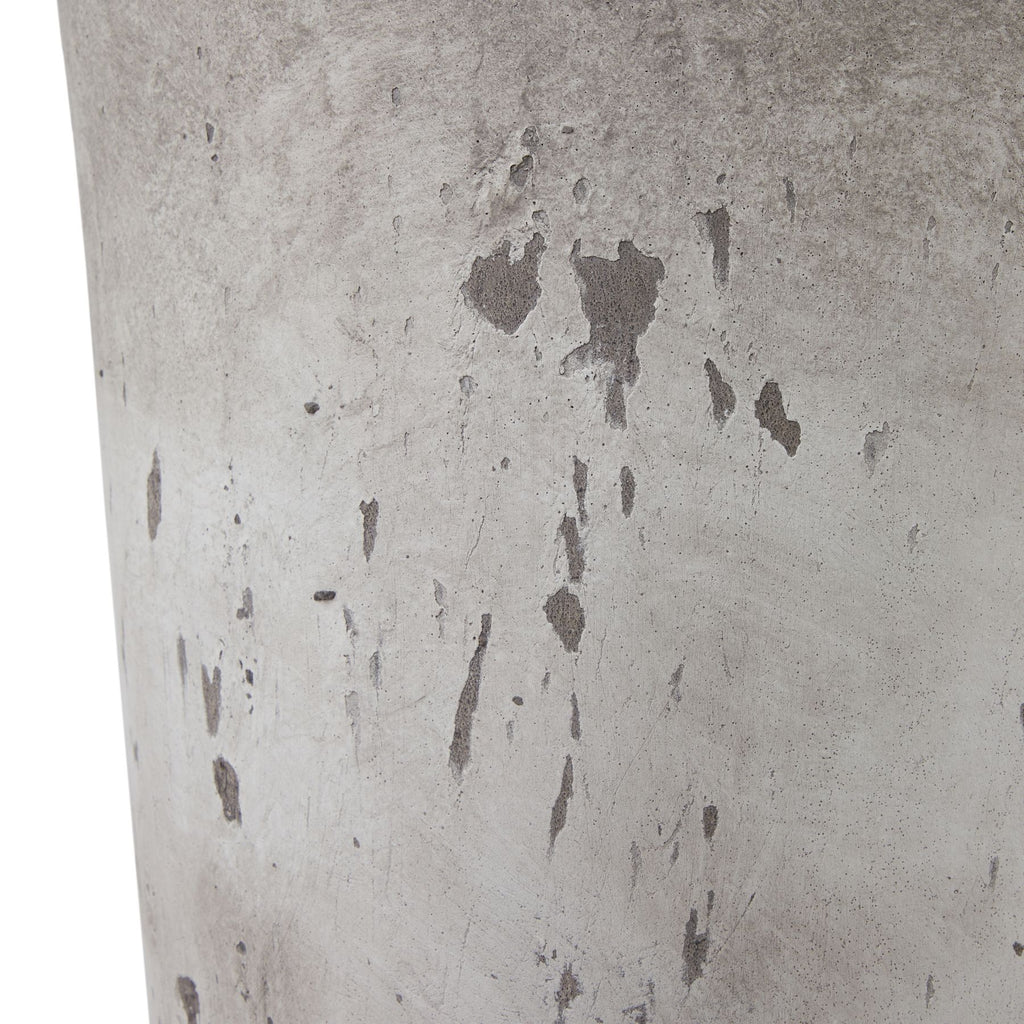 Close-up of a textured concrete surface with variations in gray tones.