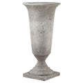 Decorative stone urn on a white background