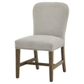 Beige upholstered chair with wooden legs on a white background