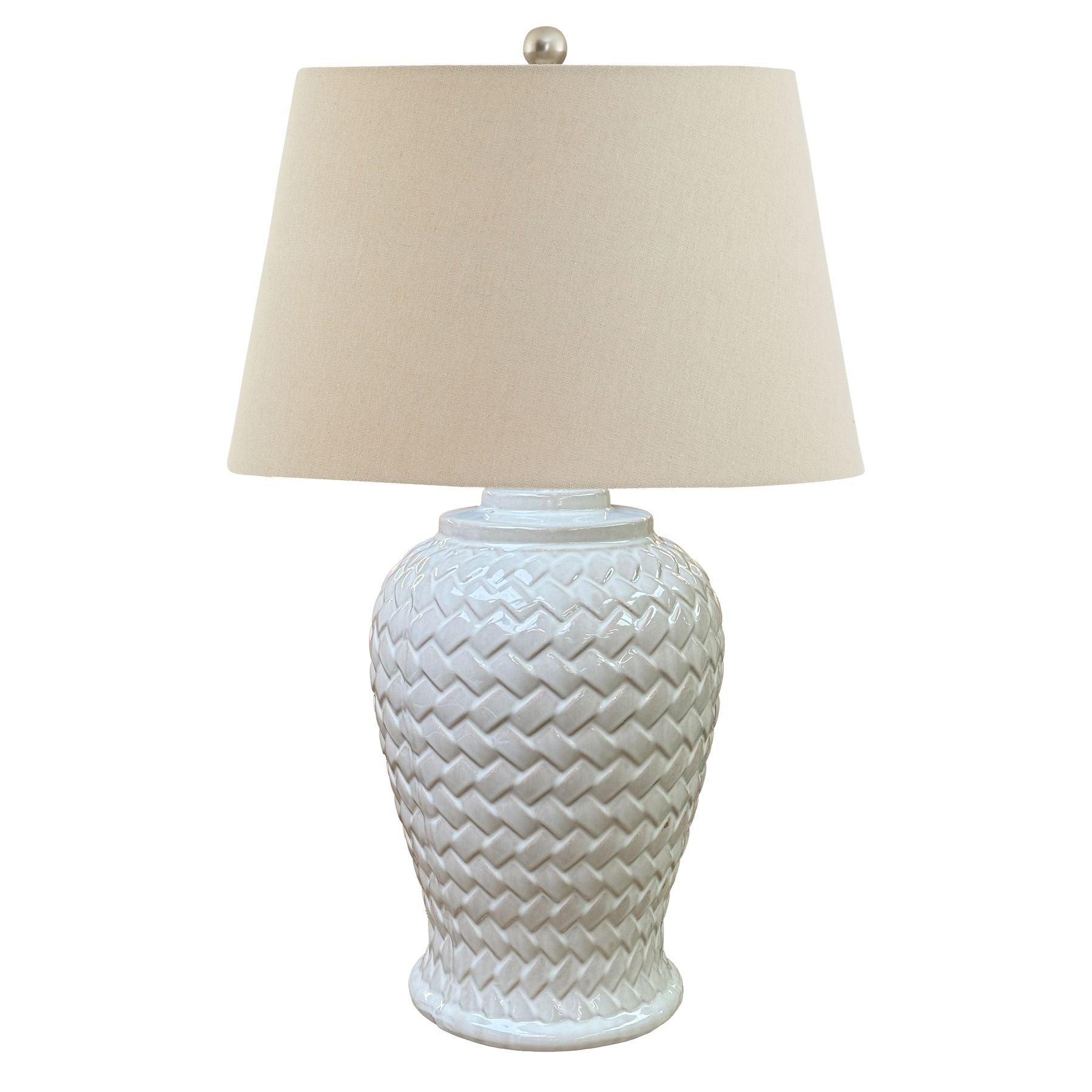 White textured table lamp with a beige lampshade on a white background