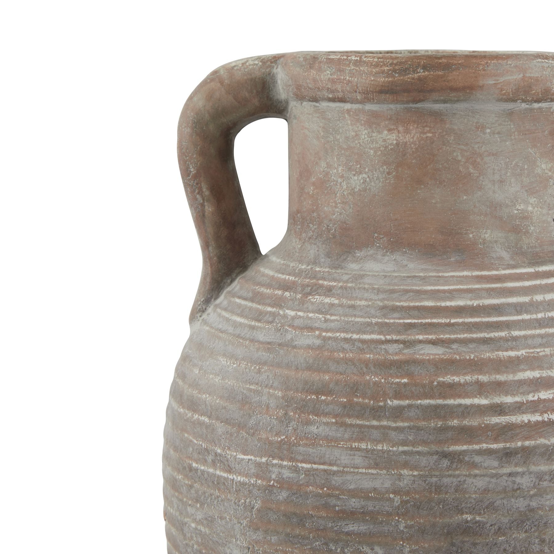 Close-up of a textured ceramic vase with a handle on a white background