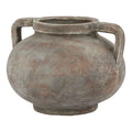 Vintage-style terracotta pot with handles on a white background