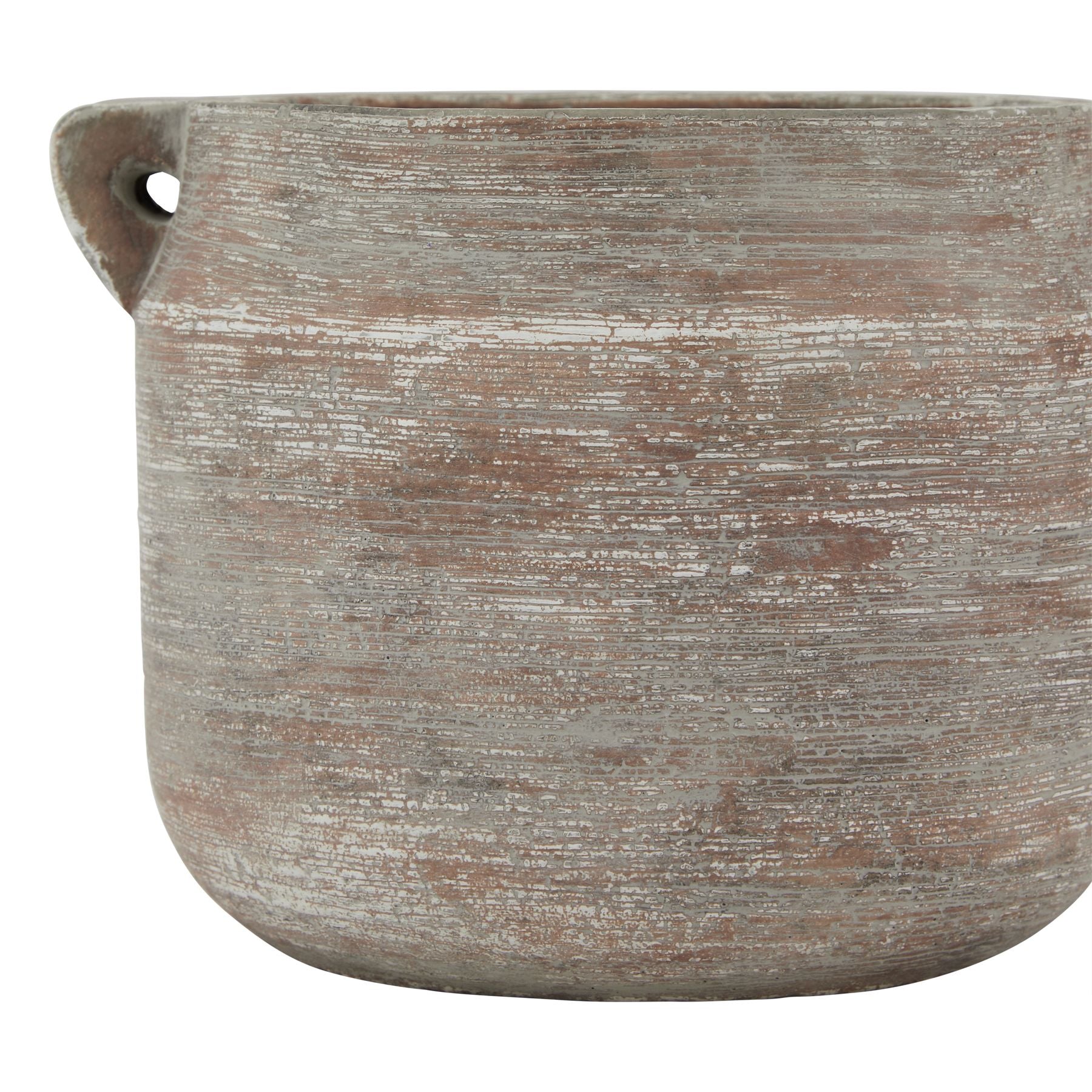 Textured ceramic planter with a handle on a white background