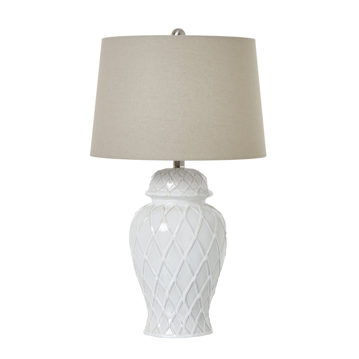 Table lamp with white textured base and beige lampshade on a white background