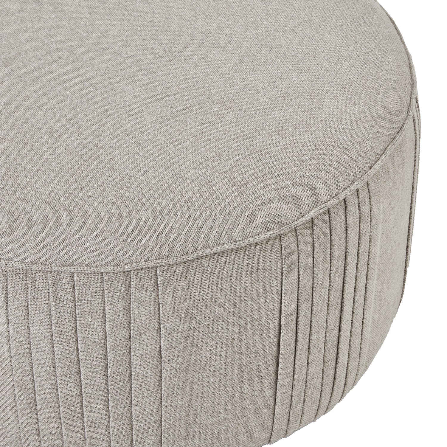 Round gray ottoman with pleated design on a white background