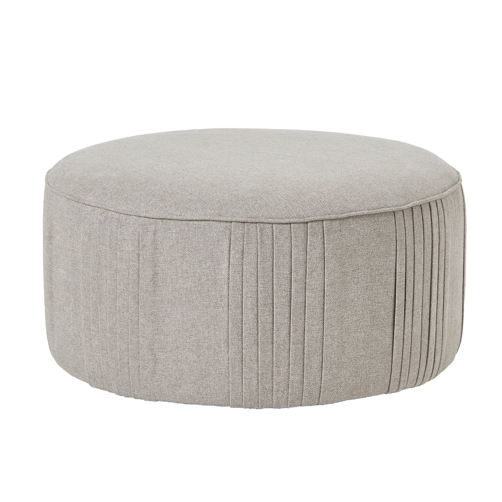 Round gray ottoman with pleated design on a white background