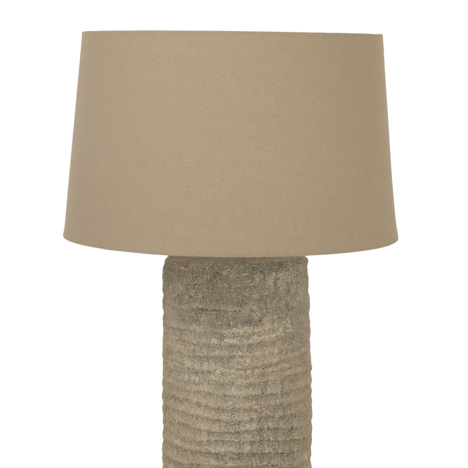 Beige textured table lamp with a matching shade on a white background