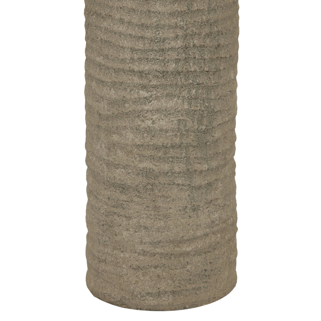 Textured cylindrical object on a white background