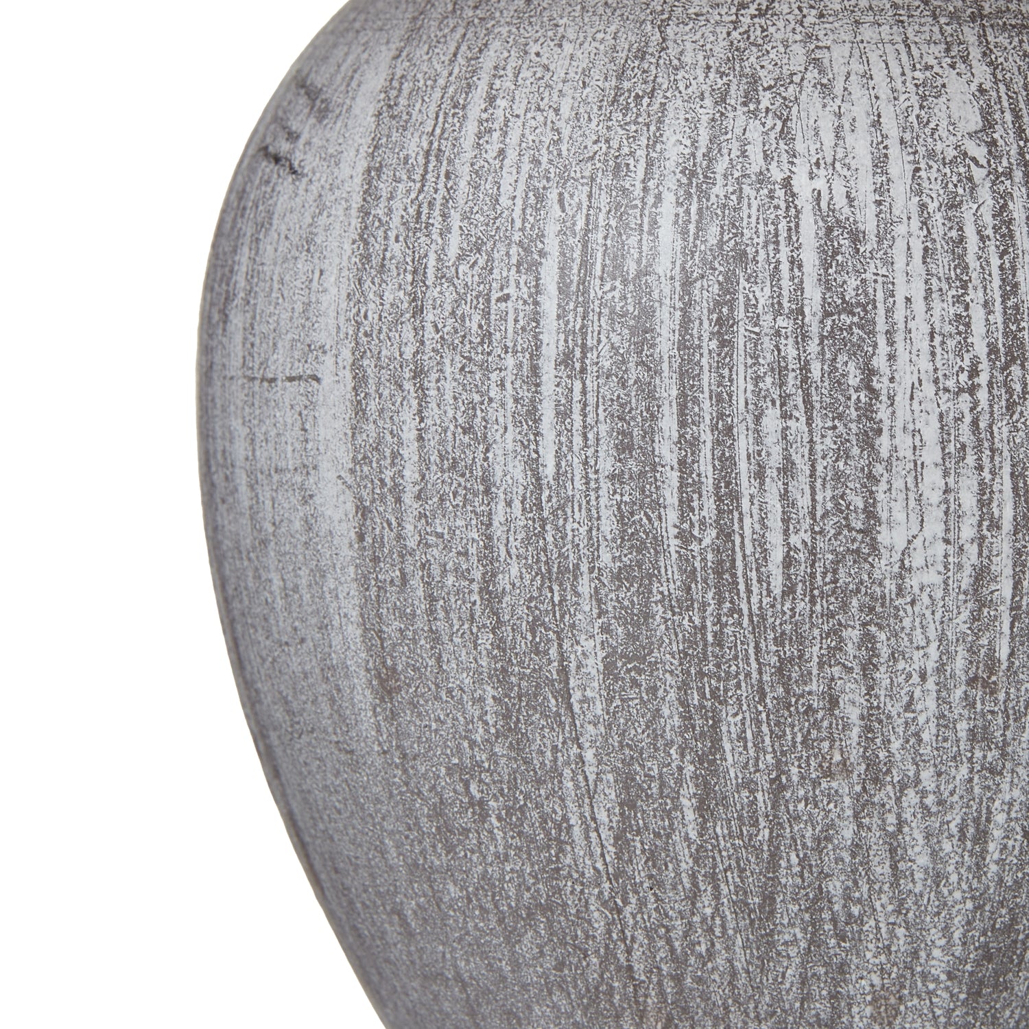 Close-up of a textured gray vase on a white background