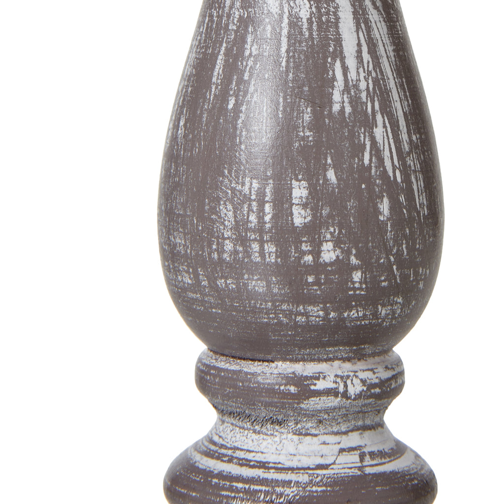 Decorative vase with textured surface on a white background