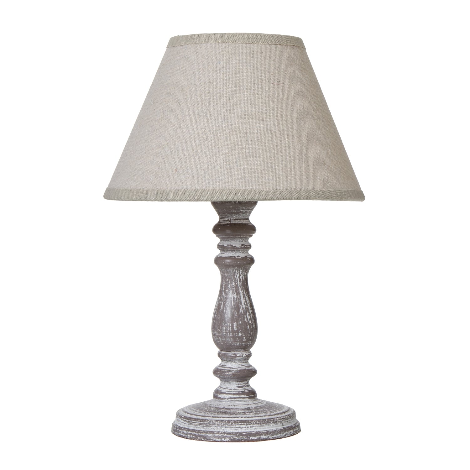 Table lamp with a beige shade and wooden base on a white background