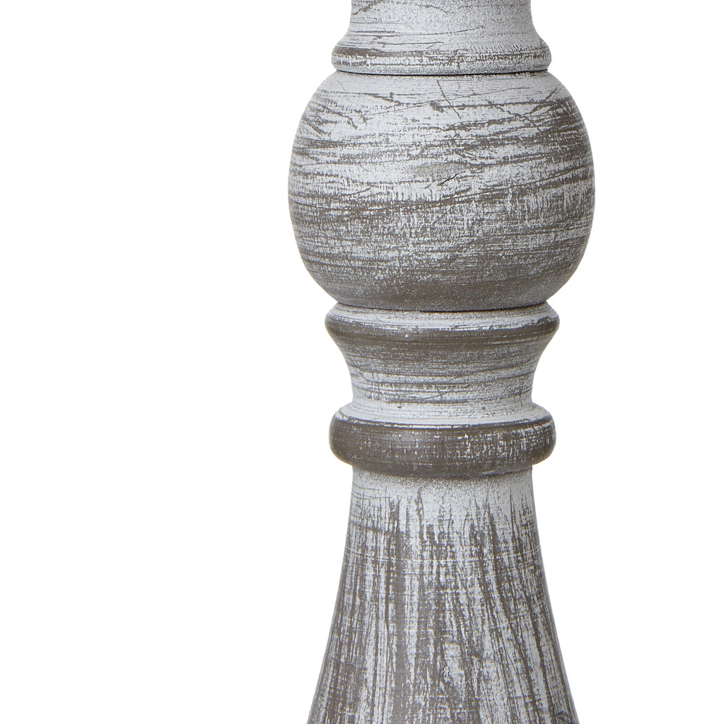 Decorative column with a rustic finish on a white background