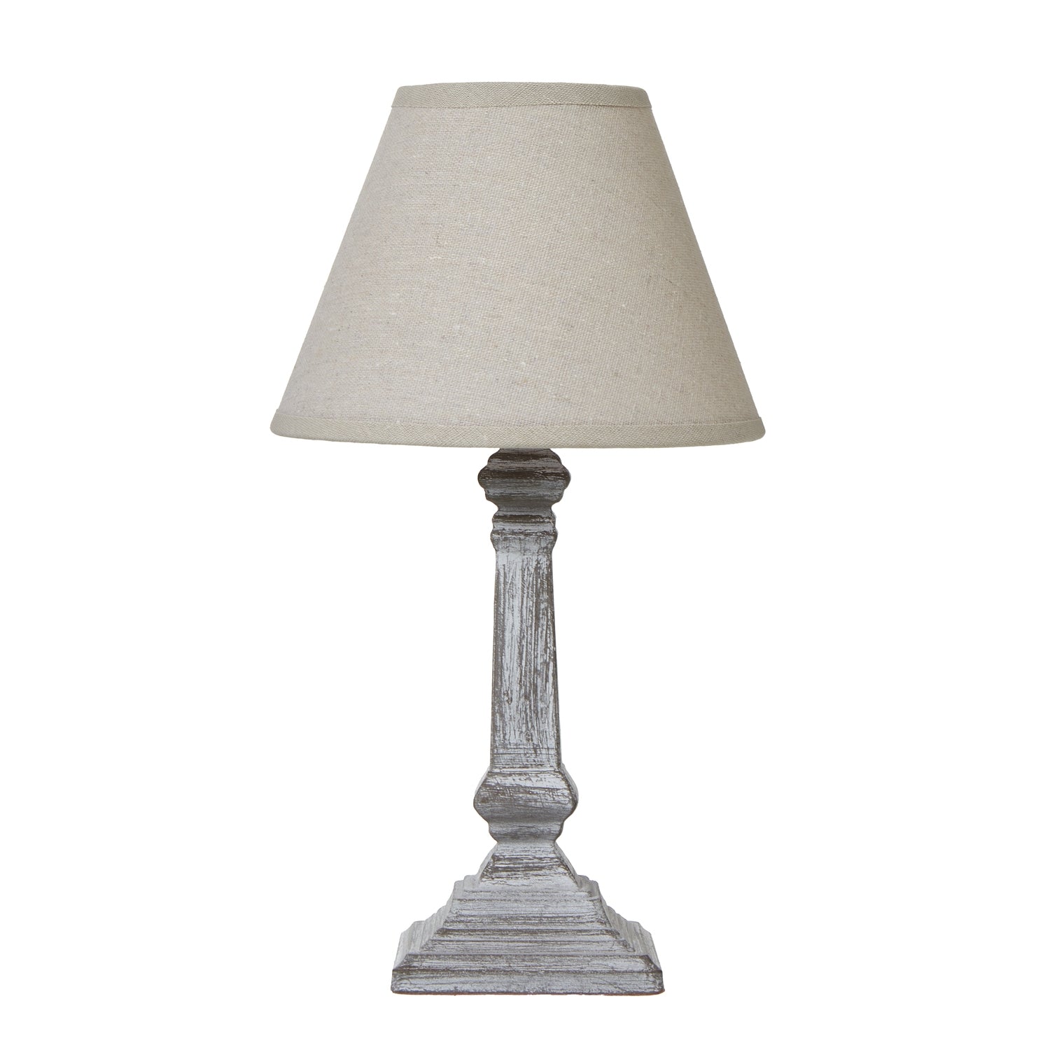 Table lamp with a beige shade and wooden base on a white background