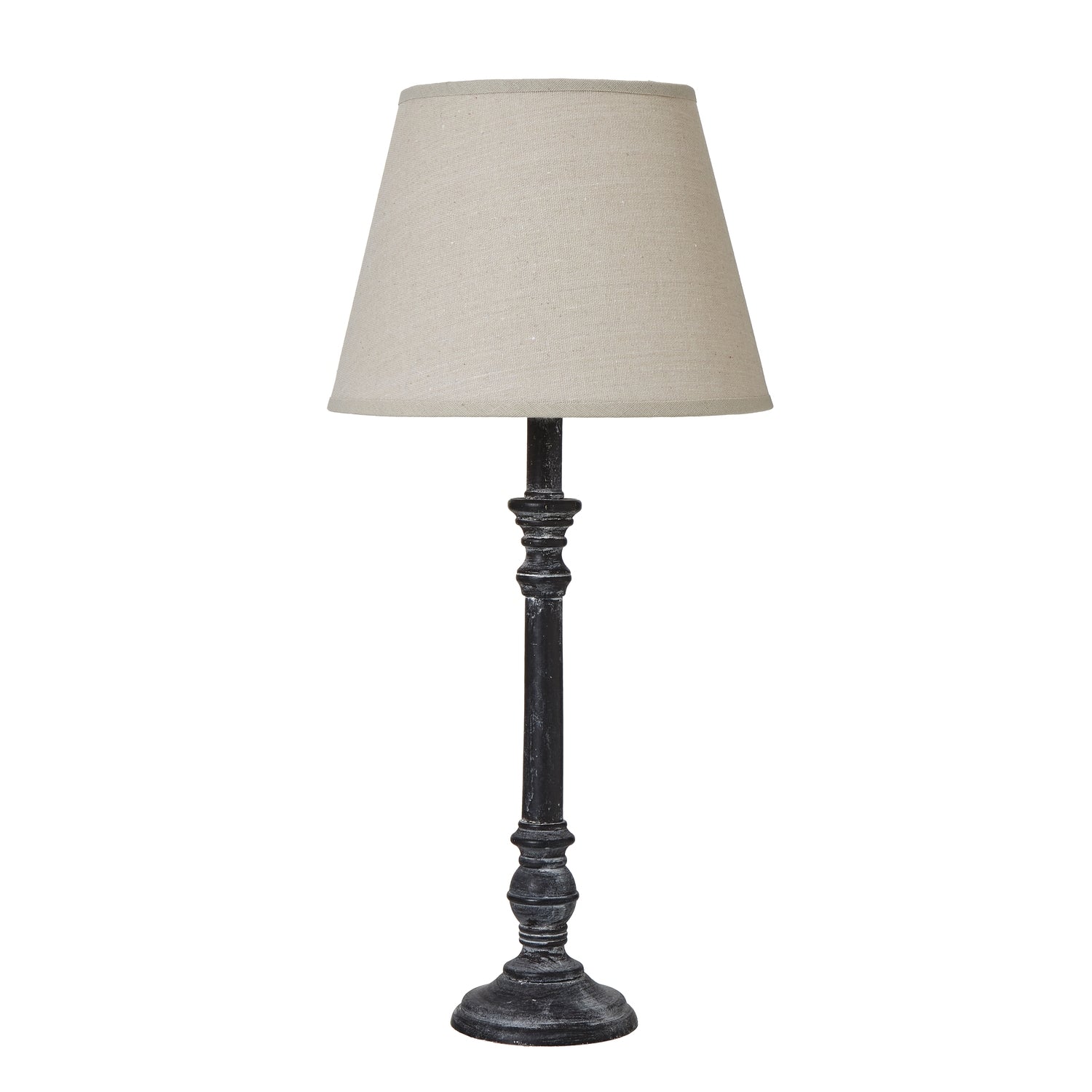 Table lamp with a beige shade on a white background