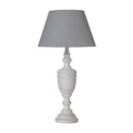 White table lamp with a gray shade on a white background