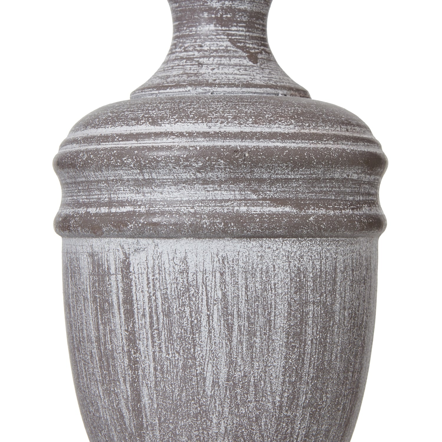 Decorative urn with textured surface on a white background