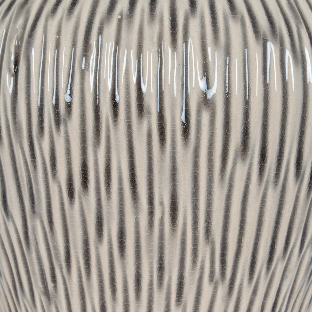 Close-up of a zebra's striped pattern on its neck.