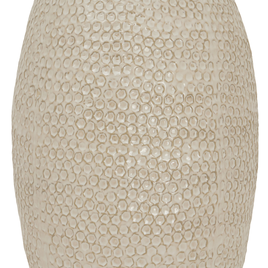 Beige textured vase on a white background