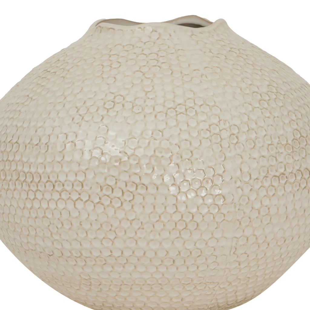 Textured beige vase on a white background