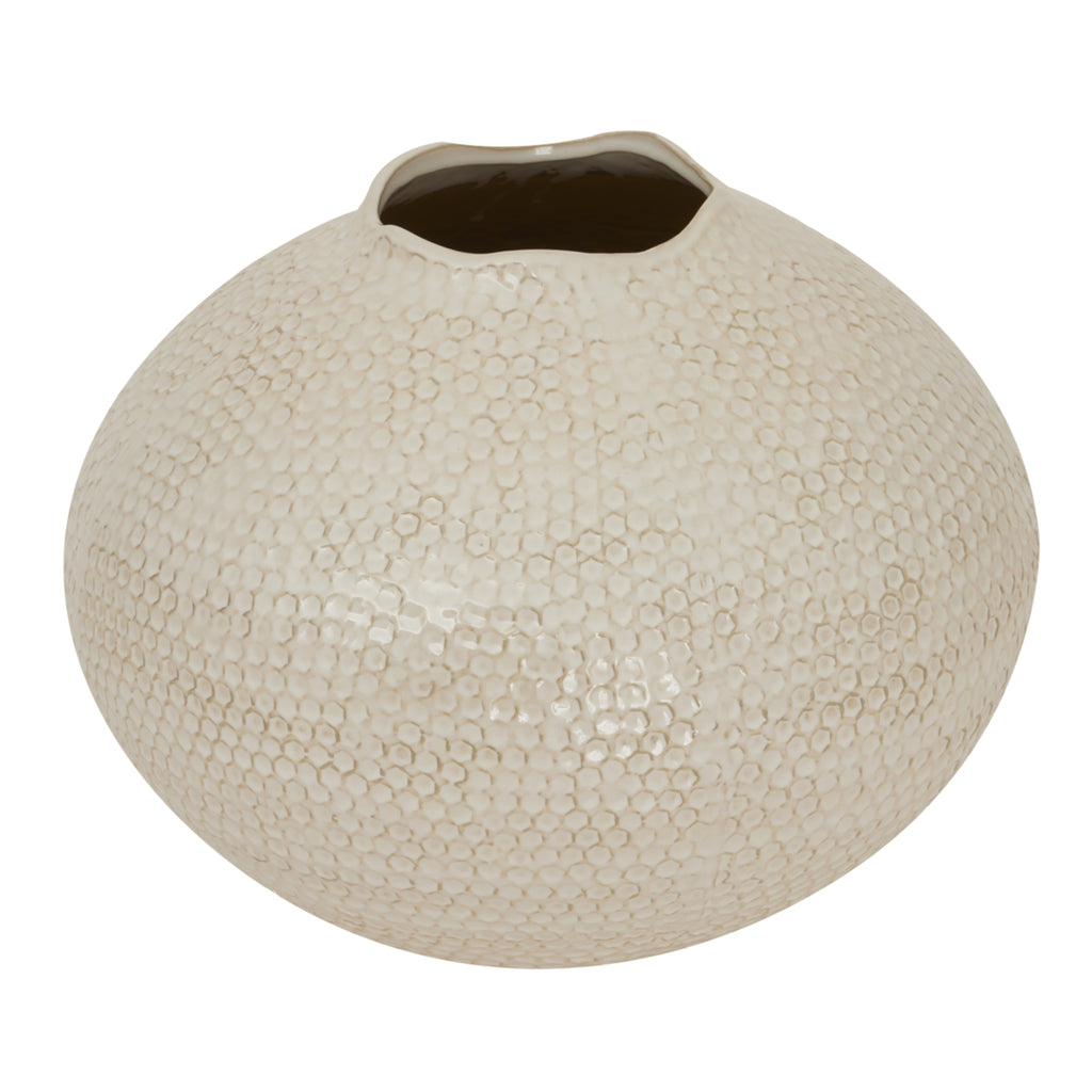 Textured beige ceramic vase on a white background
