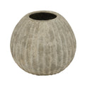 Round textured stone-like vase on a white background
