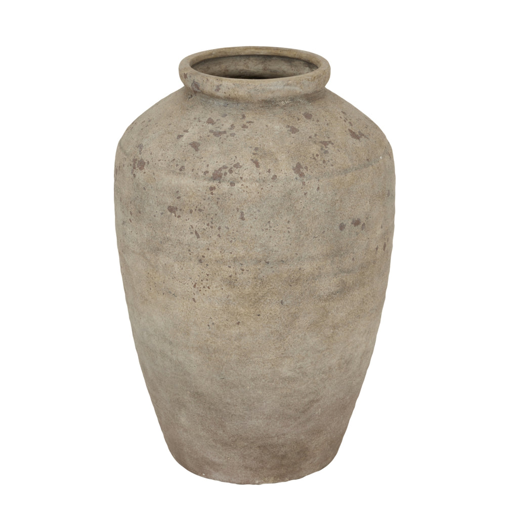 Textured beige vase on a white background
