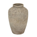 Textured beige vase on a white background