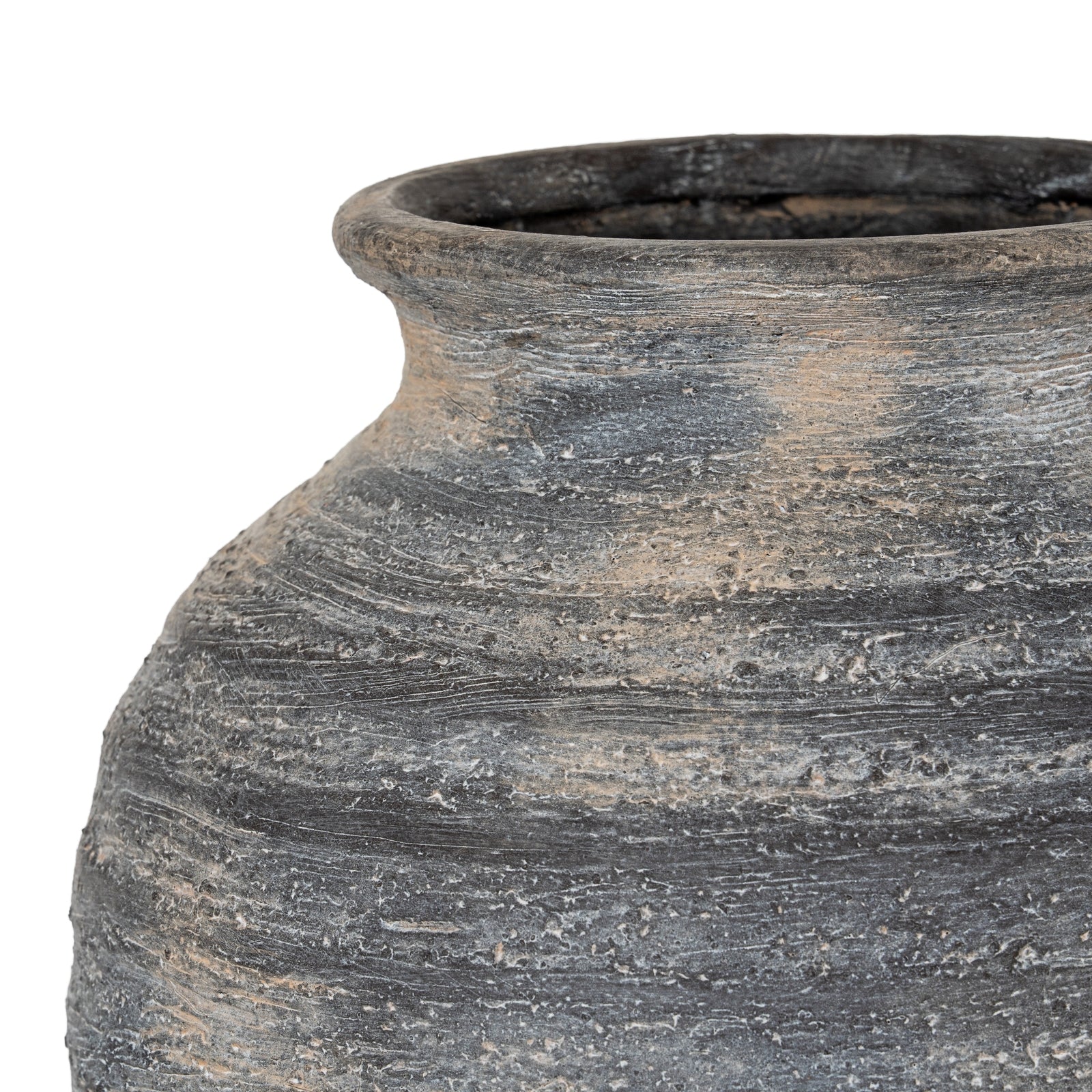 Close-up of a textured black pot on a white background