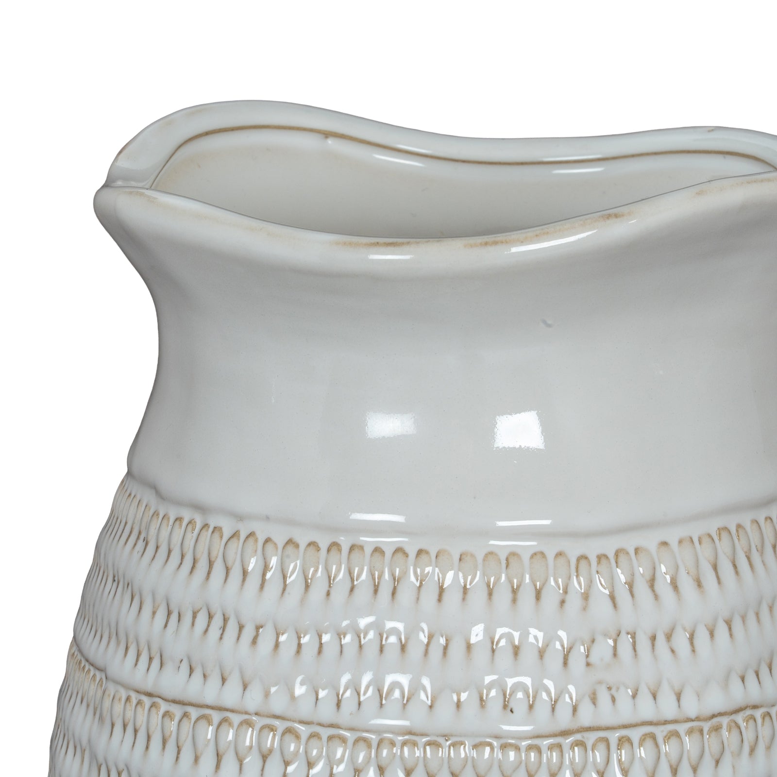 Close-up of a white ceramic vase with textured design on a white background