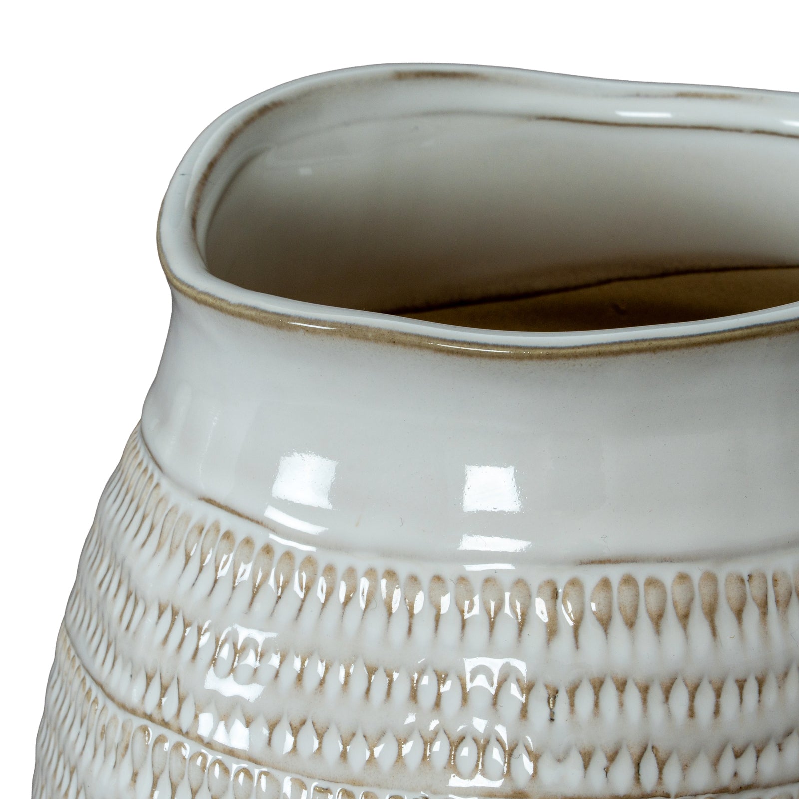 Close-up of a ceramic vase with textured design on a white background