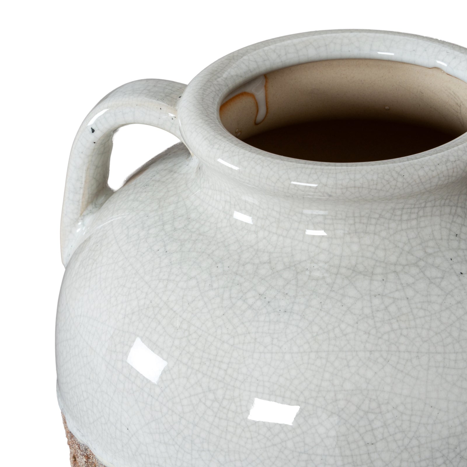 Close-up of a textured ceramic vase with a handle on a white background