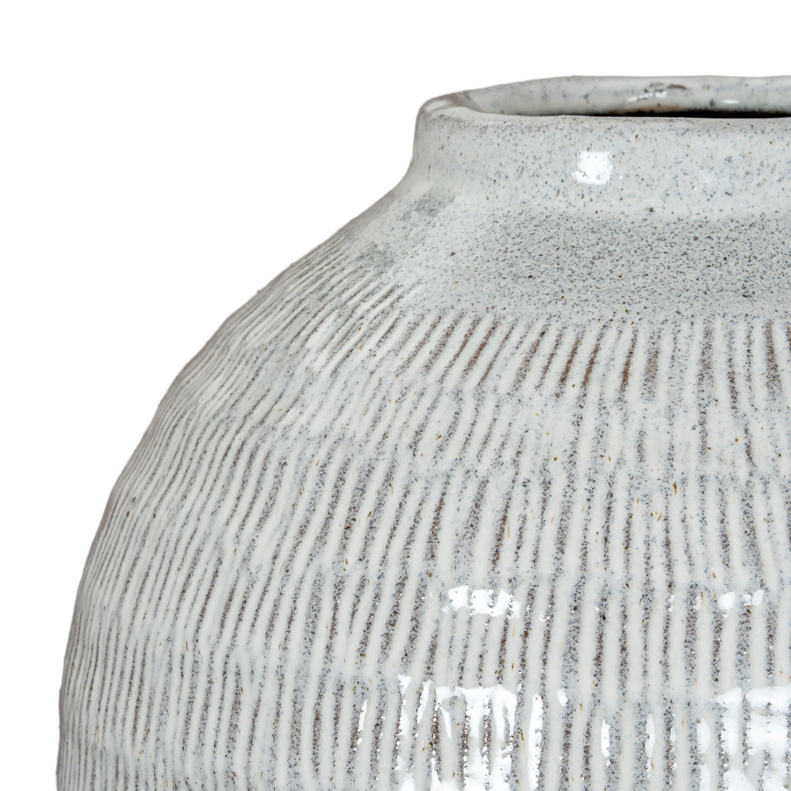 Close-up of a textured ceramic vase on a white background