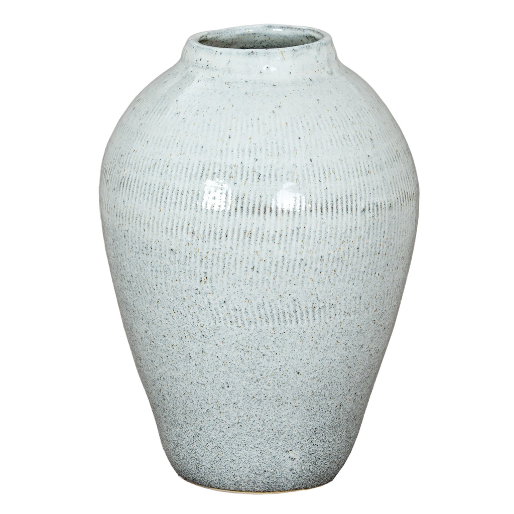 Textured ceramic vase on a white background