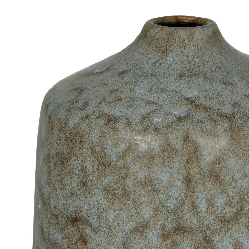 Textured ceramic vase on a white background