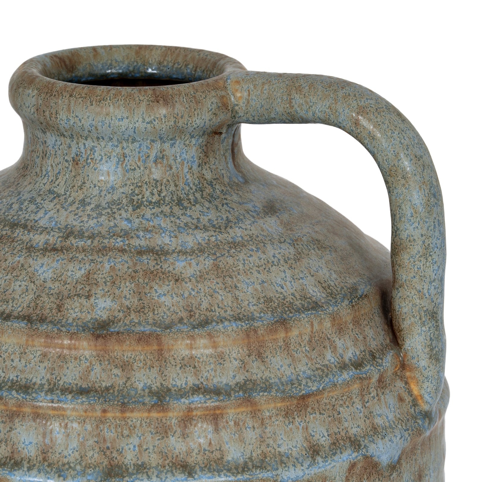 Close-up of a ceramic jar with a handle on a white background