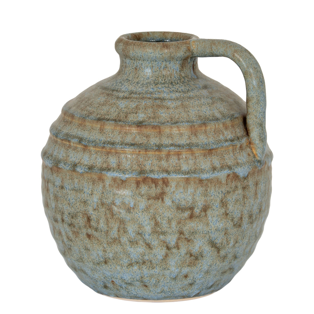 Ceramic jar with a handle on a white background